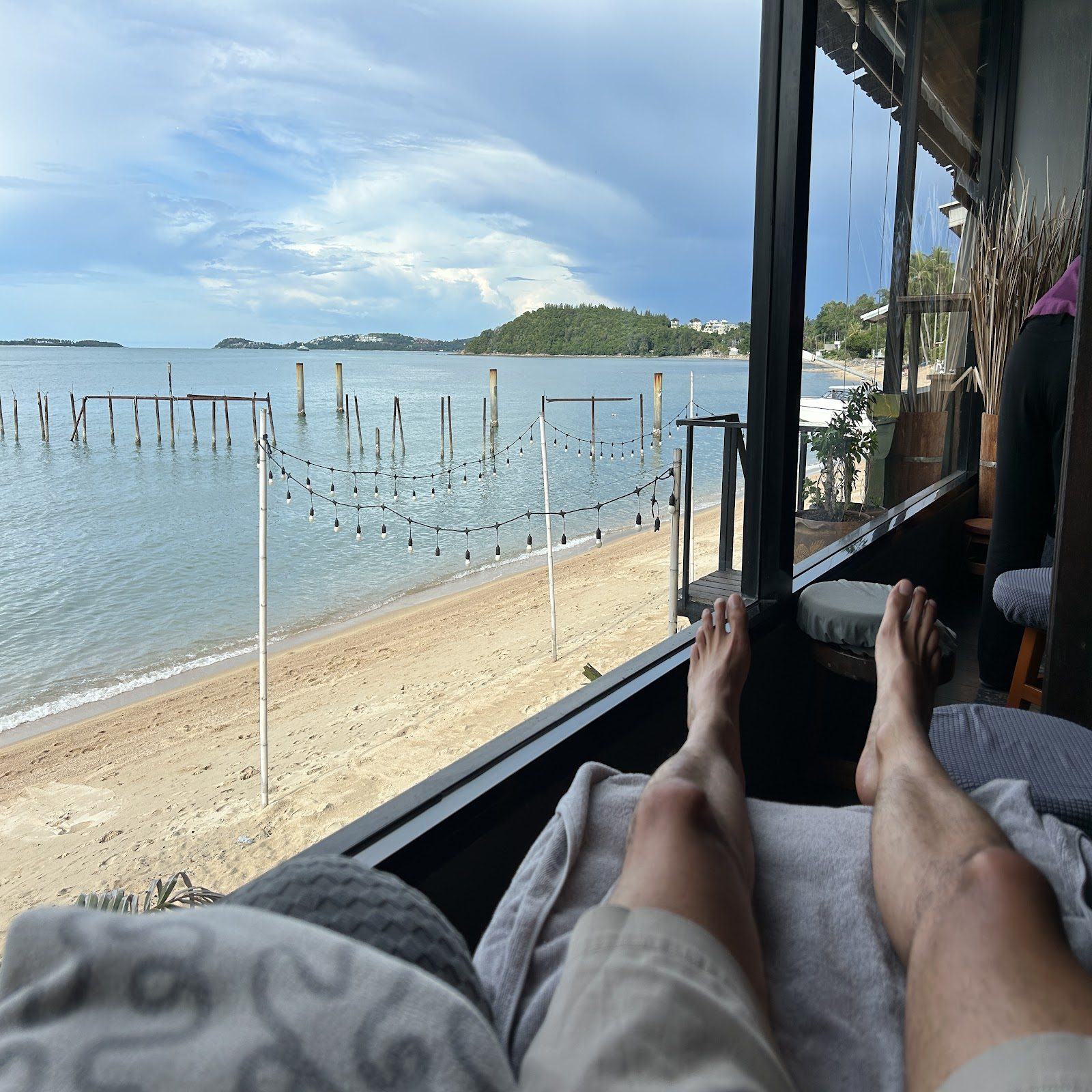 View over Bophut beach and bay from a shaded beachfront daybed